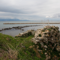 The ancient breakwater, as seen from the Byzantine Polystylon. In the background the island of Thassos.