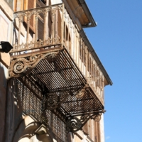 Anna Kaloudis - Kougioumtzoglou Mansion. Iron railings on the balcony.