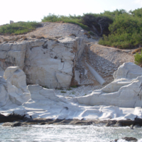 Unfinished monolithic column, viewed from the sea