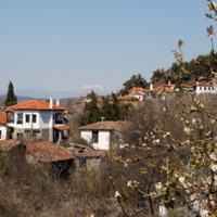 The village of Maronia facing west. In the background the mountain range of Rodopi.